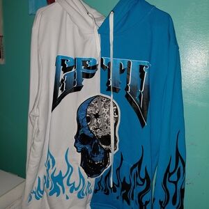 Blue and White Graphic Hoodie with Skull Design